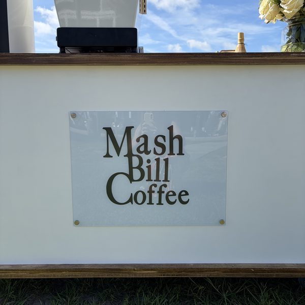The Mash Bill Coffee sign on the front of the cart